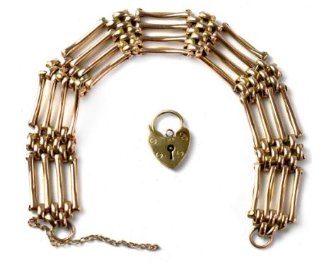 A 9ct gold four-bar gate bracelet with 9ct gold heart clasp, length 19cm, approx 17g.