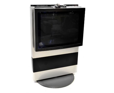 A Bang &amp; Olufsen television, model Beocenter AV5 with manual and remote control.