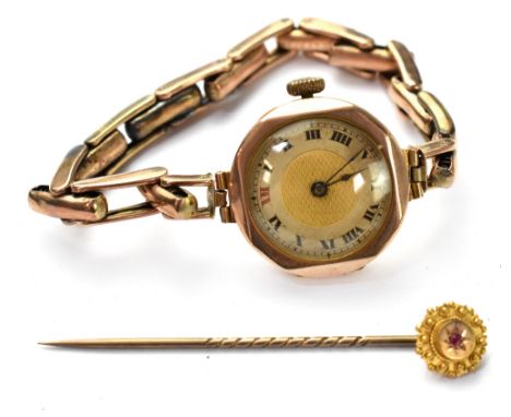 A ladies' vintage 9ct gold wristwatch with crown wound movement, the dial set with Roman numerals, on a 9ct gold flexi strap,