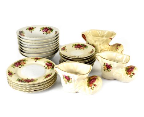 A quantity of Royal Norfolk tableware decorated with roses including dinner plates, bowls, cups, saucers, side plates, teapot