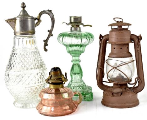 Two decorative oil lamps, one green glass example and one small pink glass example, a miner's lamp and a hobnail claret jug w