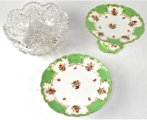 A late 19th century CB Ltd dessert service, white ground with floral spray decoration, within a green and gilt-heightened bor