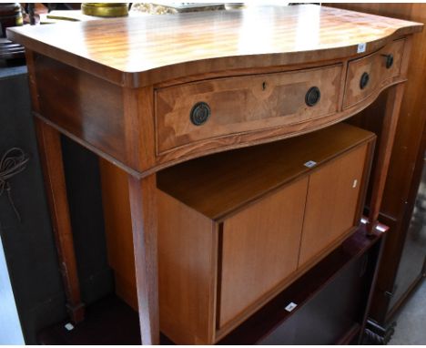 A reproduction satin wood line inlaid mahogany serpentine fronted two-drawer side table, raised on square tapering legs to sp