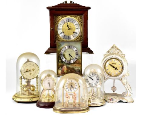 A group of various clocks to include a Metamec mahogany cased mantel clock, the glided and silvered dial set with Roman numer