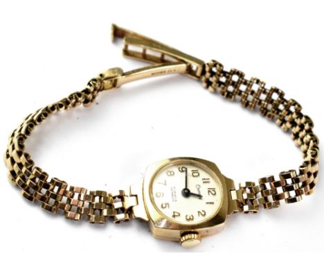 Chateau; a ladies' vintage 9ct gold wristwatch, the white dial set with Arabic numerals, manual wind movement, on 9ct gold br