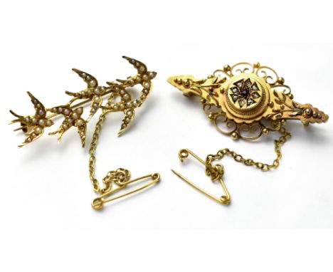 A 15ct gold diamond and ruby brooch and a gold bar brooch mounted with five small seed pearl clad swallows, with gold safety 