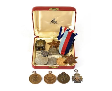 WWII medals comprising War Medal 1939-45, Defence Medal, 1939-45 Star and France and Germany Star, a Regular Army Reserve of 