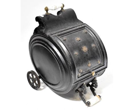 A Victorian metal barrel-form coal scuttle with applied military badges, the central for 'The Army Ordnance Corps', with chin