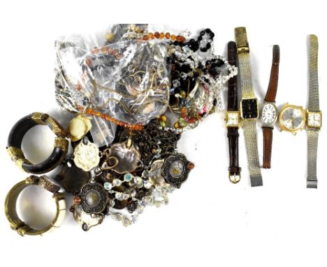 An assorted mix of various costume jewellery to include Middle Eastern style bracelet and bangles, modern and vintage necklac