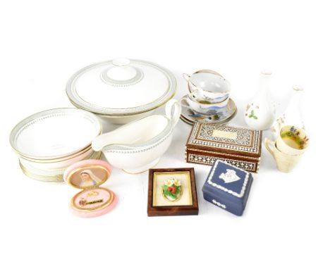 A Royal Doulton 'Berkshire' part dinner service comprising a pair of covered tureens, sauce boat and stand, six bowls, eleven