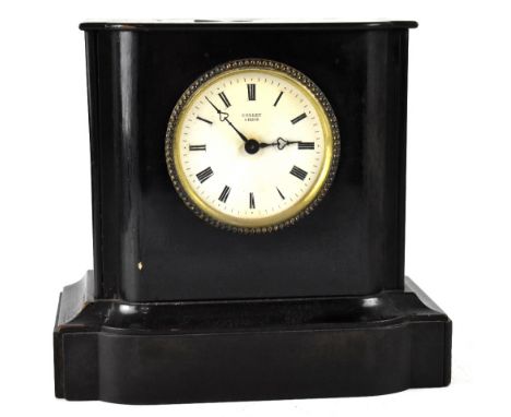 An early 20th century Collet ebonised mantel clock, the white dial set with Roman numerals, height 25cm.