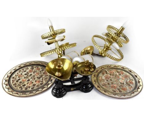 Two modern brass light fittings, two further retro wall sconces, a pair of balance scales and two enamelled plates.