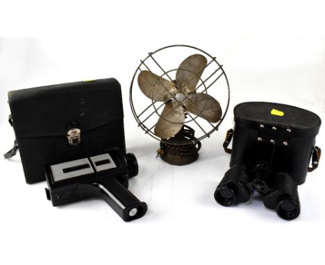 A vintage c1920s desk fan with cast metal base, a pair of Russian 8x30 binoculars in leather case and a vintage Chinon Classi