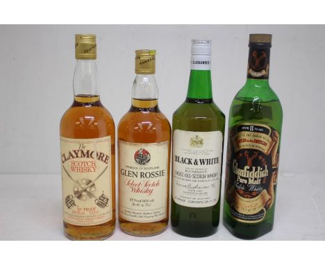 A Selection Of Four Bottles Of Whisky To Include Glenfiddich Pure Malt, Buchanan's Black & White , The Claymore Scotch, Glen 