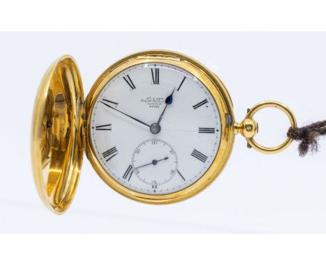 An early 20th century 18ct gold hunter pocket watch, by McCabe Royal exchange London, white enamel dial with Roman numeral ma