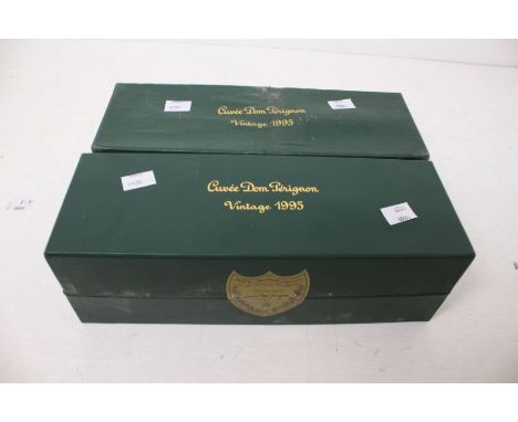 Two Bottles Of Cuvee Dom Perignon 1995 In Presentation Boxes Boxes Have Signs Of Age And Damage But Are Still Sealed 