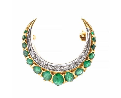 An emerald and diamond 18ct gold crescent brooch, set to the outer edge with graduated oval cut emeralds, with an inner borde