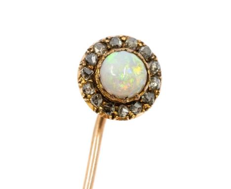 A late Victorian/early Edwardian opal and diamond gold stick pin, comprising an opal set round terminal, claw set within a bo