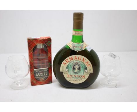 Bottle of Armagnac (1964) with two glasses and a bottle of Stratton's Scotch Whiskey 