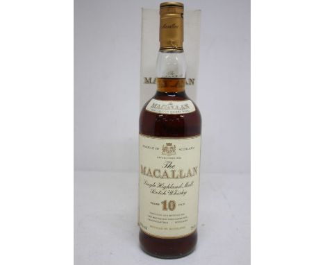 A Bottle Of The Macallan Gold 10 Year Old Scotch Whisky Matured In Sherry Wood. Box Is In Good Overall Condition Bottle Is In