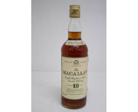 A Bottle Of The Macallan Whisky Single Malt Scotch 10 Years Old The Bottle Is In Good Overall Condition Seal Is Intact, And M