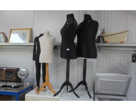 Three tailors dummies on stand and one child mannequin