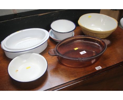 A quantity of enamel dishes and bowls, a glazed mixing bowl etc. 
