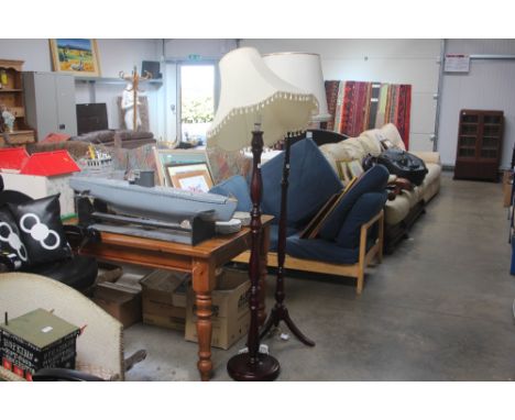 A reproduction mahogany standard lamp and shade