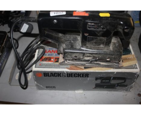 A Black &amp; Decker orbital sander 