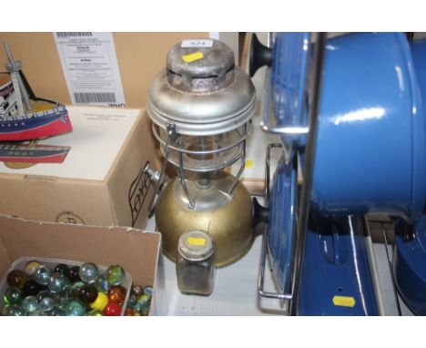 A paraffin hurricane lamp