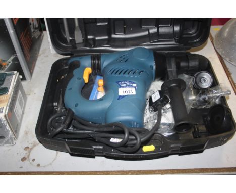 A Power Craft rotary hammer drill in fitted case 