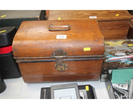 A small Japanned tin trunk