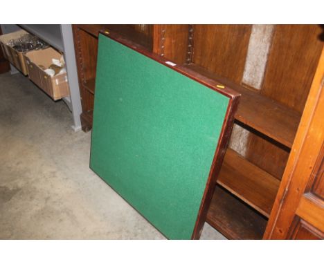 A folding card table 