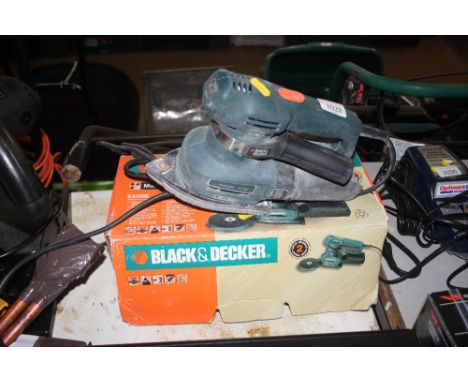 A Black &amp; Decker orbital sander 