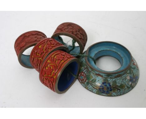 A 19th Century Chinese cloisonne holder and pair of enamel and coral rings carved with Chinese scenes and figures 