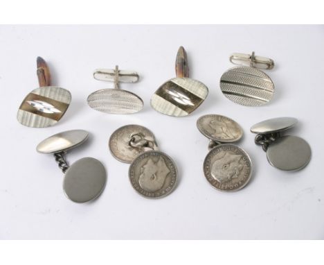 Four pairs of silver cufflinks 