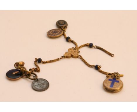 A quality 19th century gold plated and yellow metal chatelaine with attached enamel fobs including a rose gold tone fob with 