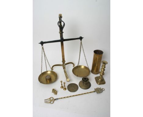 A box of brass ware including scales
