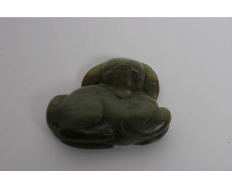 A further Chinese carved jade of a mythical animal