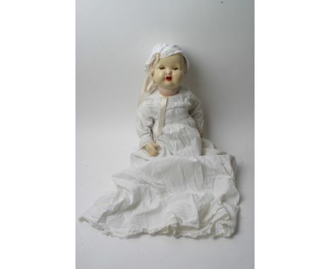 A German bisque headed doll by Max Handwerck having closing eyes and open mouth