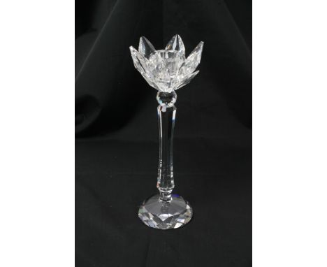 A Swarovski crystal boxed candlestick shaped as a flower