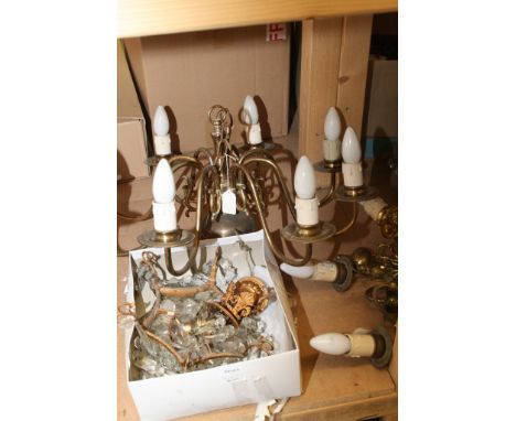 A collection of brass and silver wall light fittings including an 8 bracket chandelier 