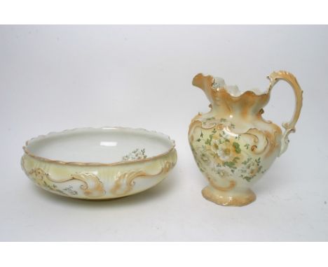 A decorative late Victorian ceramic jug and bowl (2) 