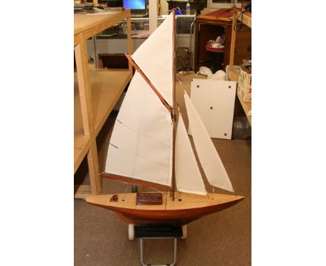 A 36" scratch built pond yacht, cedar planked over frames and gaff rigged with spare light air fore sail. All standing riggin
