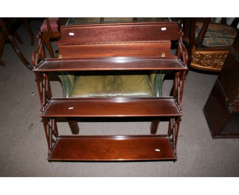 A mahogany open hanging shelf of George III design 