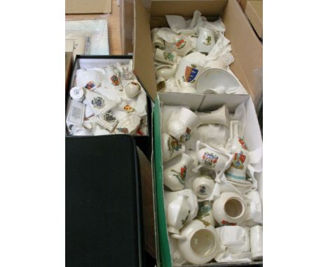 Three boxes of assorted crested china including Goss