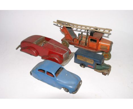 A collection of four tin plate toy vehicles comprising a Chad Valley Harborne car, a Triang Mimic lorry, a red car and a Fire