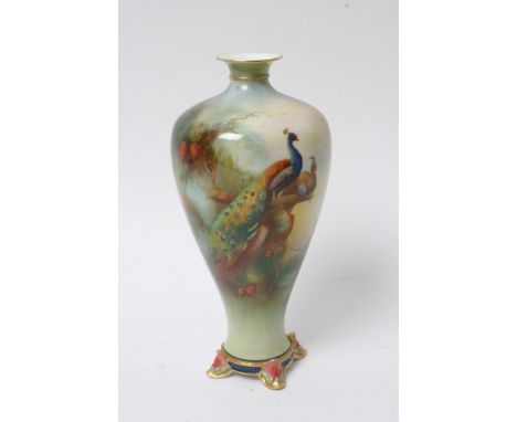 A Royal Worcester vase decorated with a Peacock amongst foliage, signed H Martin (22cm) 