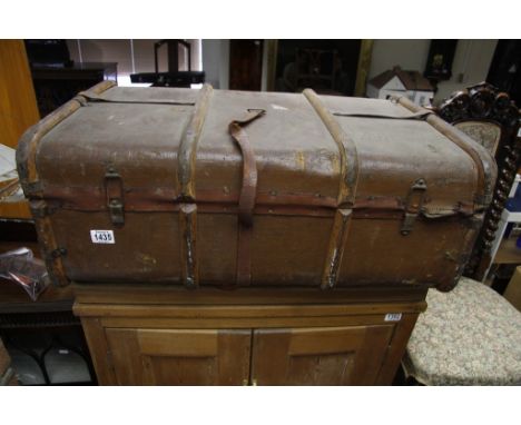 An old wood bound travelling trunk