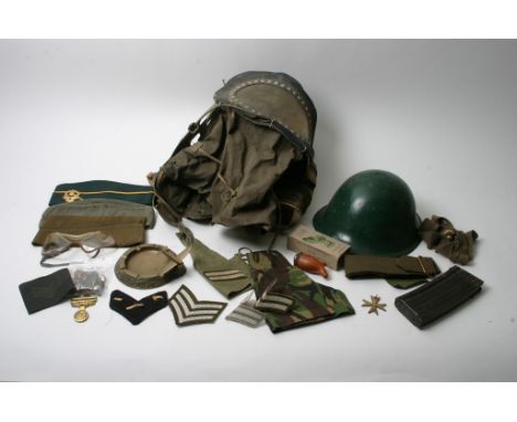 A interesting collection of military items including an probable WW2 pilot's helmet